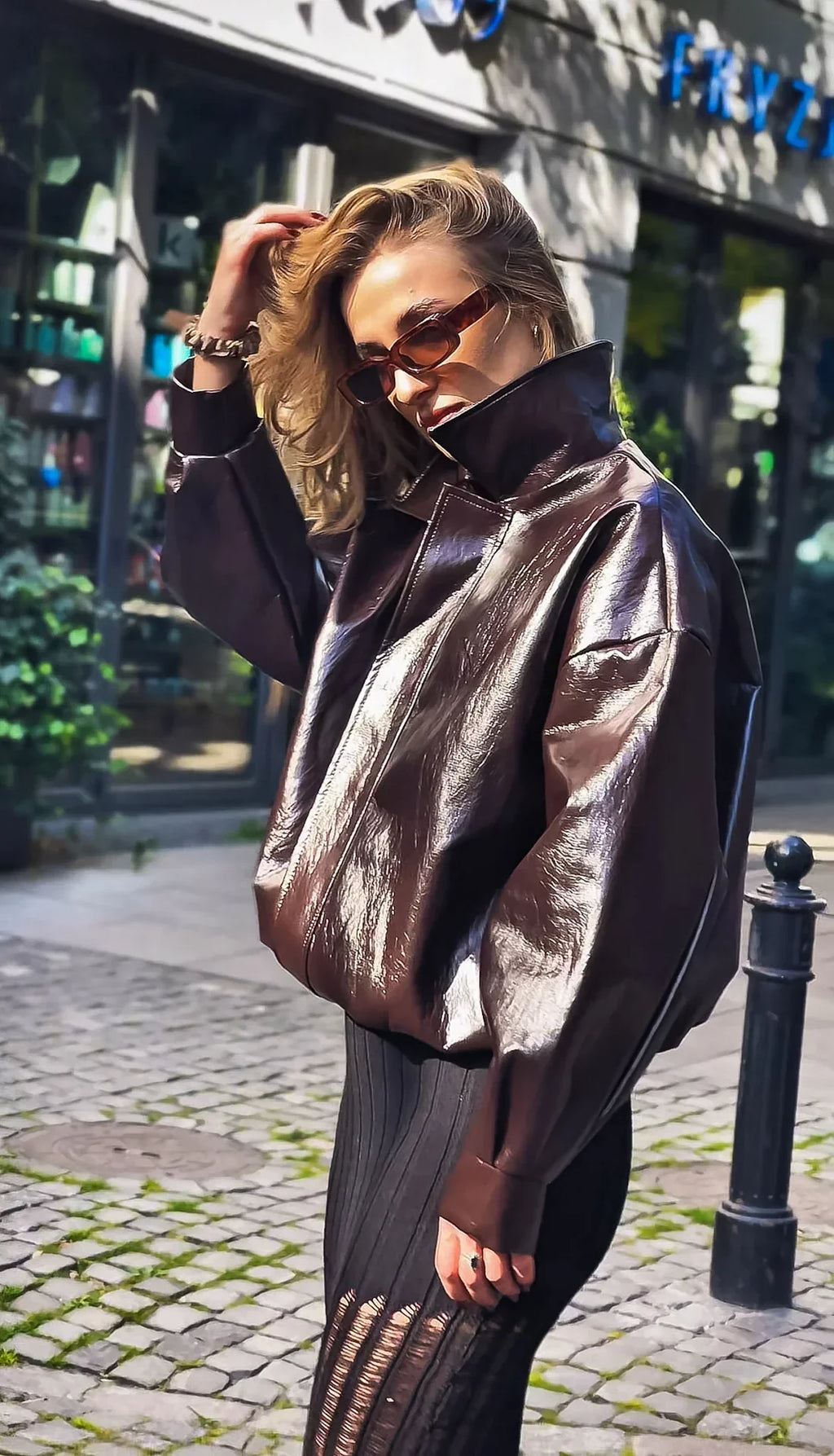 Women’s shiny chocolate-colored jacket – elegance and style