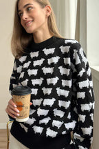 CAMILLA | LOOSE KNIT SWEATER WITH ANIMAL PRINT